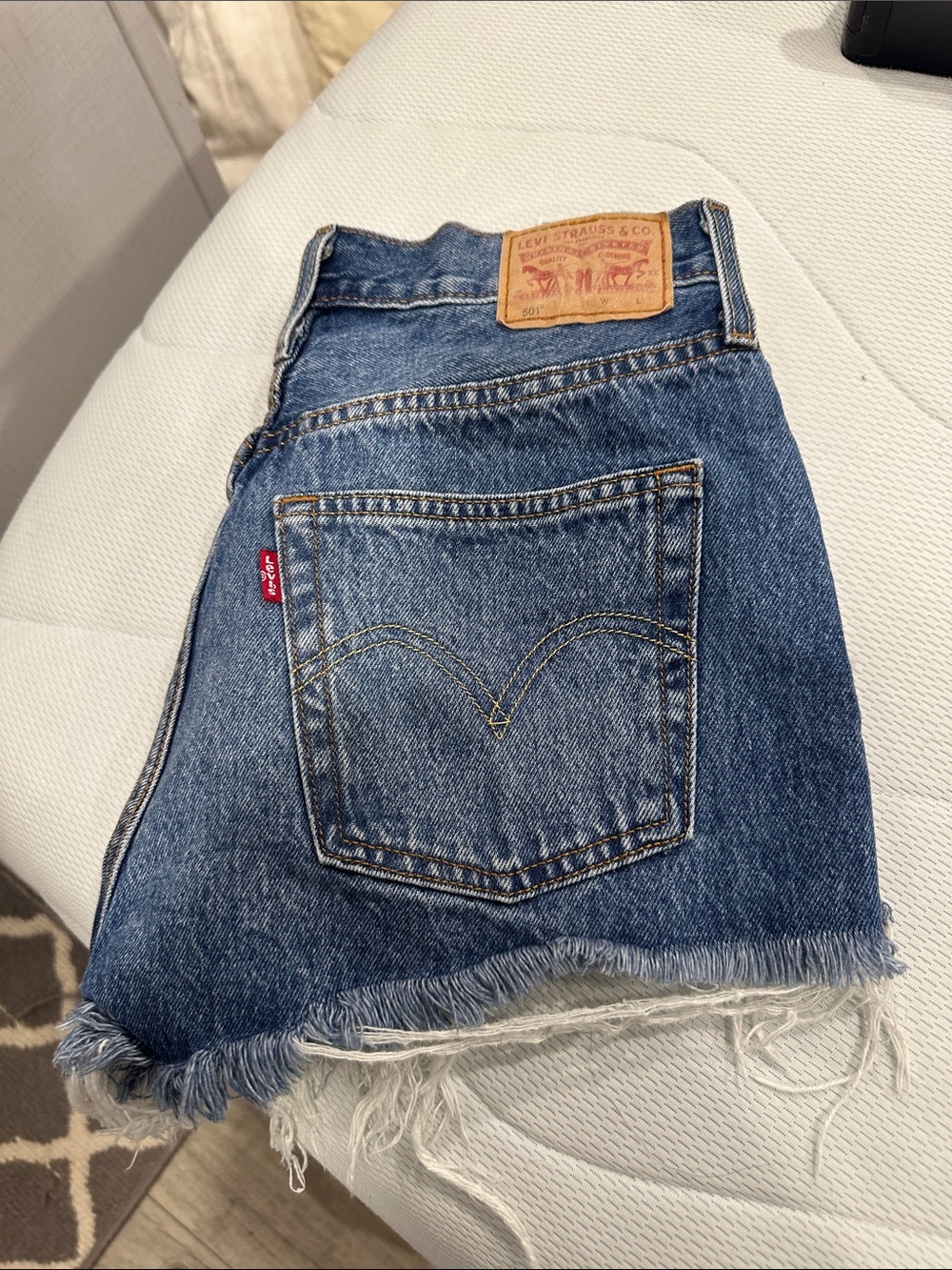 Levi's Medium Blue Denim Frayed Hem Shorts